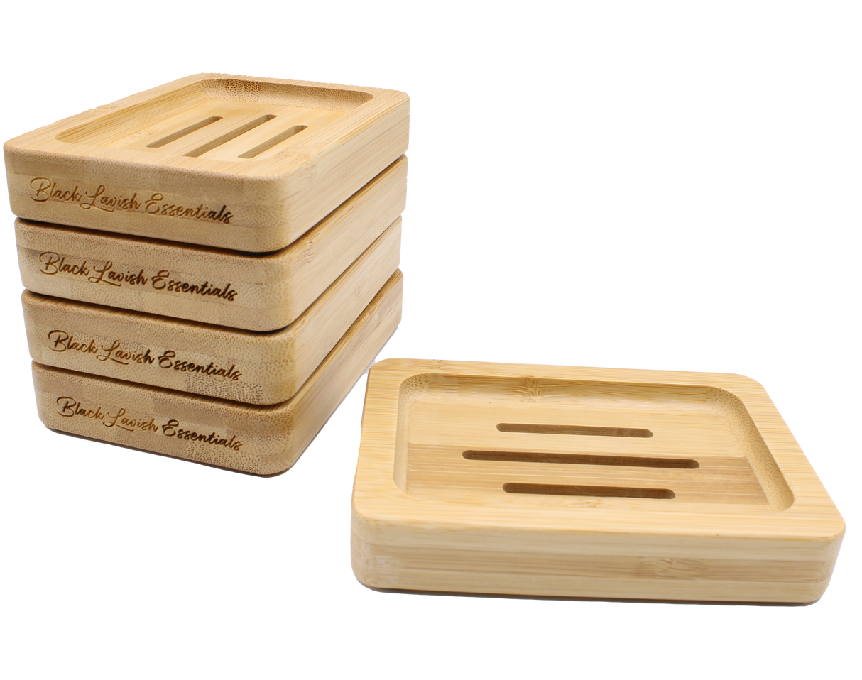 Bamboo wooden soap dishes with Black Lavish Essentials engraved logo, classic 3-slot drainage design for the perfect elegant bathroom aesthetic. Made to preserve your bar soaps in style and class.