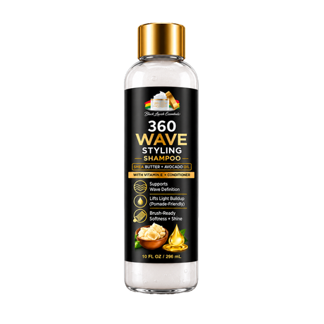 A 10 fl oz bottle of Black Lace Hairstyles 360 Wave Styling Shampoo with Butter + Avocado. The bottle is clear plastic with a shiny gold cap and a black label featuring gold and white text, with illustrations of butter and avocado.