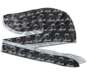 Black satin durag headband with 'Lavish' branding and white circular patterns on a white background. 

Silk durag made for laying down 360 waves and drying hair after applying wave pomade and brushing.

Luxury comfort, wave protection, and timeless streetwear style.