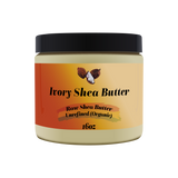 Jar of Ivory Shea Butter with a black lid on a white background