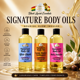 Three bottles of Signature Body Oils with colorful labels on a decorative background.