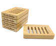 Set of premium wooden soap dishes with Black Lavish Essentials engraved branding, featuring modern 6-groove drainage design for the perfect elegant bathroom aesthetic. Made to preserve your bar soaps in style.