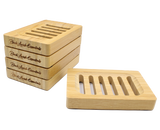 Set of premium wooden soap dishes with Black Lavish Essentials engraved branding, featuring modern 6-groove drainage design for the perfect elegant bathroom aesthetic. Made to preserve your bar soaps in style.