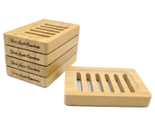 Set of premium wooden soap dishes with Black Lavish Essentials engraved branding, featuring modern 6-groove drainage design for the perfect elegant bathroom aesthetic. Made to preserve your bar soaps in style.