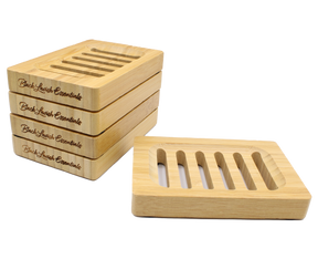 Set of premium wooden soap dishes with Black Lavish Essentials engraved branding, featuring modern 6-groove drainage design for the perfect elegant bathroom aesthetic. Made to preserve your bar soaps in style.