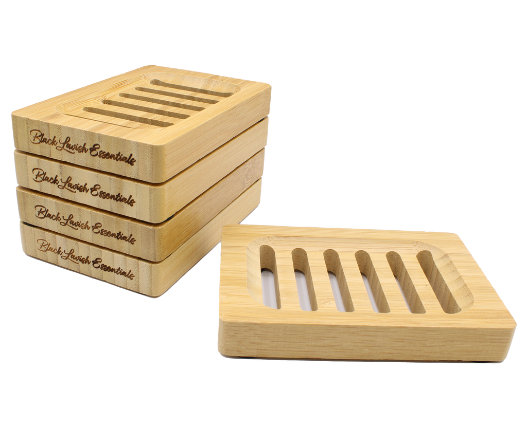 Set of wooden soap dishes with 'Black Lavish Essentials' branding on a white background
