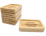 Bamboo wooden soap dishes with Black Lavish Essentials engraved logo, classic 3-slot drainage design for the perfect elegant bathroom aesthetic. Made to preserve your bar soaps in style and class.